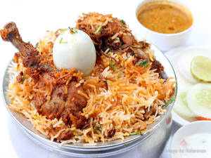 Chicken Biryani In Silver Saucepan Wallpaper