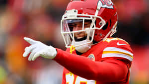 Chiefs Player Pointing During Game Wallpaper