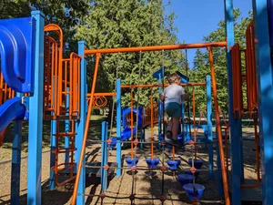 Child At Playground Burnaby Wallpaper