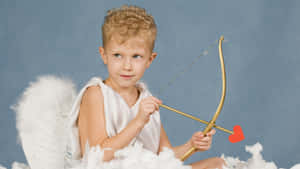 Child Dressed As Cupid Wallpaper