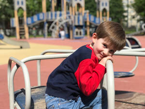 Child On Playground Wallpaper