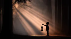 Child's Silhouette With Lantern In Beams Of Forest Light Wallpaper