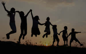 Children Joyful Sunset Silhouette Wallpaper