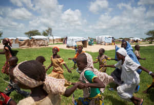 Children Receiving Humanitarian Aid Wallpaper