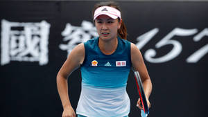 Chinese Pro Tennis Player Shuai Peng In Action Wallpaper