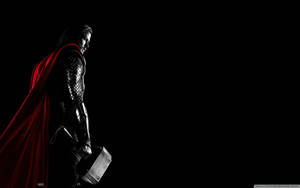 Chris Hemsworth As Thor From Marvel's Thor Movies Wallpaper