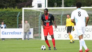 Chris Mavinga Red Kit Soccer Field Wallpaper