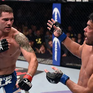 Chris Weidman In An Intense Face-off With An Opponent. Wallpaper