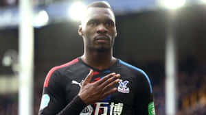 Christian Benteke With Hand On Chest Wallpaper