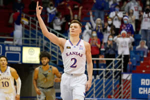 Christian Braun Kansas Basketball Player Celebration Wallpaper