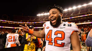 Christian Wilkins Victory Celebration Wallpaper