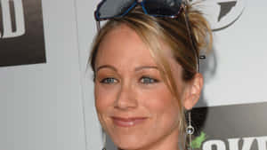 Christine Taylor Radiant In Blue Wallpaper