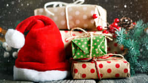 Christmas Hat And Gifts Wallpaper