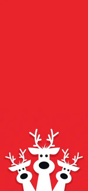 Christmas Reindeer On Red Background Wallpaper