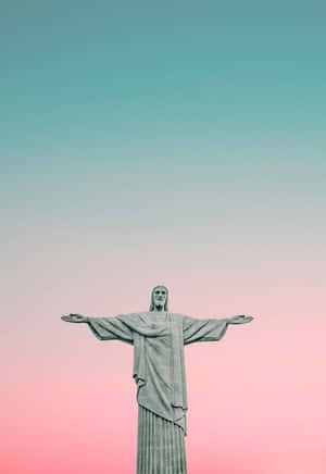 Christthe Redeemer Statueat Dusk Wallpaper