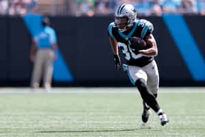 Chuba Hubbard Carolina Panthers Running Back Action Wallpaper