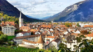 Chur Cityscapewith Mountains Switzerland Wallpaper