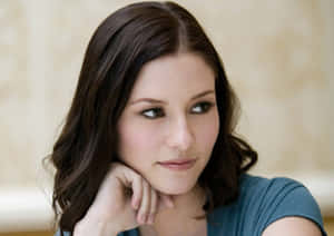 Chyler Leigh Posing At A Photoshoot Wallpaper