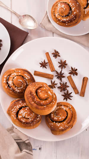 Cinnamon Rollswith Spices Top View Wallpaper