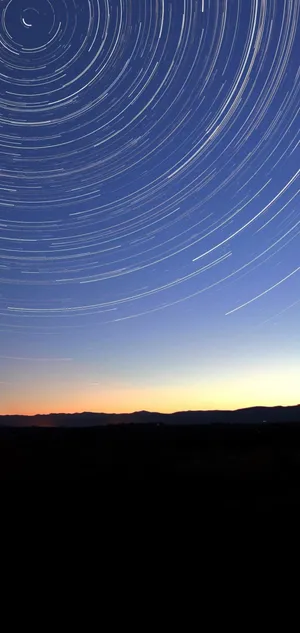 Circular Lines On Sky Punch Hole 4k Wallpaper