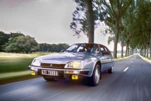 Citroen G T I Turbo Speedingon Country Road Wallpaper