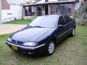 Citroen Xantia Cruising On An Open Road. Wallpaper