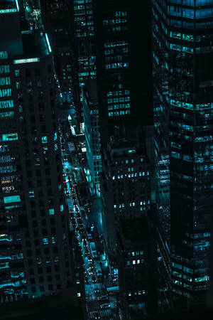 City Buildings At Night Wallpaper