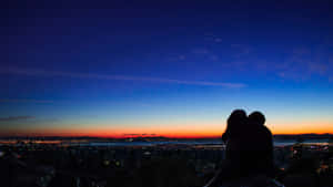 City Lights Sunset Couple Wallpaper