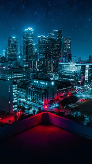 City_ Night_ Skyscrapers_ Under_ Stars.jpg Wallpaper