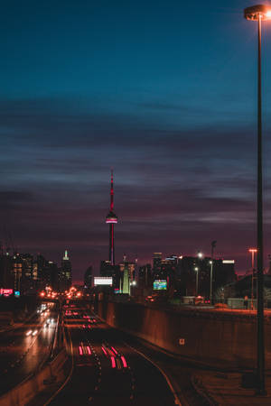 City Tower With Neon Lights Wallpaper