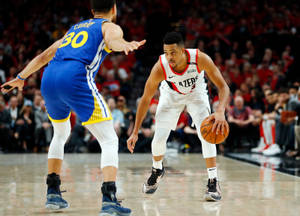 Cj Mccollum Against Stephen Curry Wallpaper