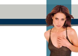 Claire Forlani Posing Elegantly Against A Rustic Wooden Background Wallpaper