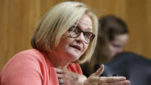 Claire Mccaskill In Peach Coat Wallpaper