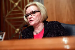 Claire Mccaskill Sophisticated In A Black Coat Wallpaper