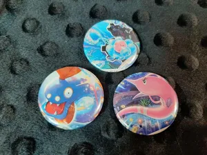 Clamperl, Huntail, And Gorebyss Badges Wallpaper