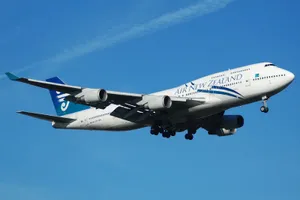 Classic 747 Airplane Soaring Through The Sky Wallpaper