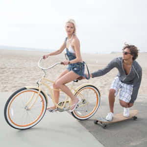 Classic Beach Cruiser On Sunny Shoreline Wallpaper