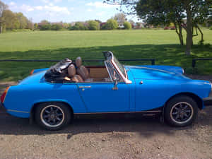 Classic Beauty Of The Golden Mg Midget Wallpaper