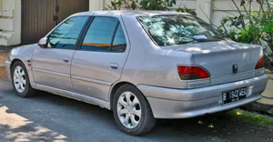 Classic Beauty: Peugeot 306 In Its Prime Wallpaper