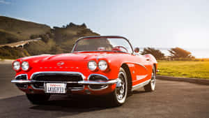 Classic Beauty - The Chevrolet Corvette C1 In Red Wallpaper