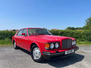Classic Bentley Eight - The Epitome Of Luxury And Elegance Wallpaper