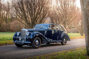 Classic Bentley Mark Vi - Elegance On Wheels Wallpaper