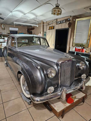 Classic Bentley S2 On A Royal Blue Background Wallpaper