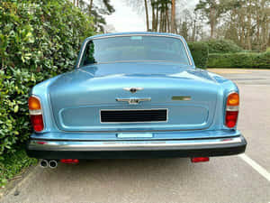 Classic Bentley T2 On A Scenic Drive Wallpaper