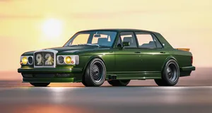 Classic Bentley Turbo R Cruising On The Road Wallpaper