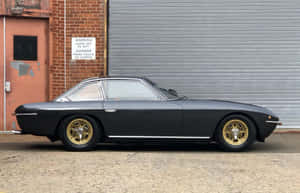 Classic Black Lamborghini Islero Side View Wallpaper