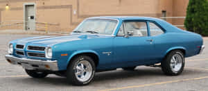 Classic Blue Pontiac Ventura Parked Wallpaper