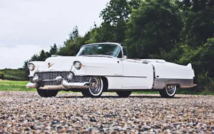 Classic Cadillac Eldorado Driving In Style Wallpaper