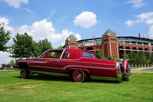 Classic Cadillac Fleetwood In All Its Glory Wallpaper