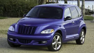 Classic Chrysler Pt Cruiser On Scenic Road Wallpaper